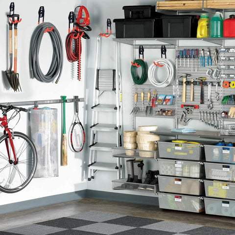 16 Pack Garage Hooks Set Durable Wall Mount Storage System With Heavy Duty Industrial Hangers For Bikes Tools Ladders Mops And Brooms Extension Straps 100 Lbs Capacity Orange installed holding various items in a garage setting.