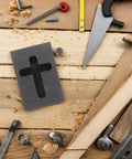 Graphite Cross Shaped Casting Mold for Melting Trusted by Jewelers High Precision Graphite Tool on a woodworking table