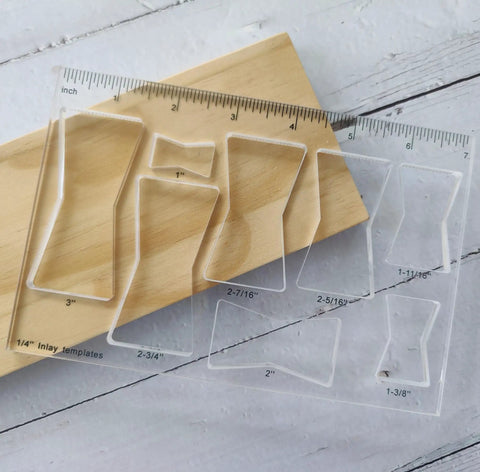 Rock Solid Acrylic 8 In 1 Bowtie Butterfly Router Template Jig Kit Woodworking DIY Inlay Guide on wooden surface with ruler.