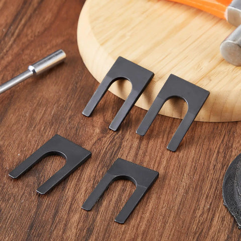 Heavy Duty Four Pack Drill Chuck Removal Wedge Set Compatible With Jt33 And Jt6 Arbors, No Sweat Keyless Chuck Extractor Tool Opens, 4 black steel wedges on wood.