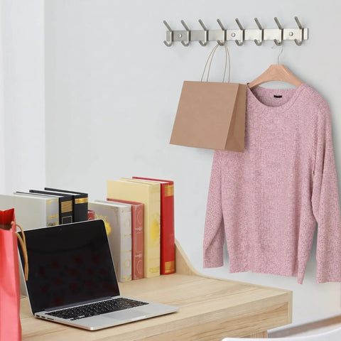 Brushed Nickel Wall Mount Coat Rack With 24 Inch Stainless Steel Rail And 8 Heavy Duty Double Hooks on office wall with books