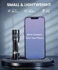 Rechargeable EDC Flashlight 1800 Lumen Output Beast Mode Bright Pocket Light next to smartphone, highlighting size comparison.