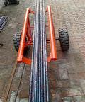 Beefed Up Heavy Duty Double Utility Pole Dolly With Two Wheel Concrete Pole Transport Cart For Electrical Crews Built Tough With Solid Steel Frame Easy Maneuver On Rough Job Sites And Heavy Poles, steel frame with two wheels carrying concrete poles