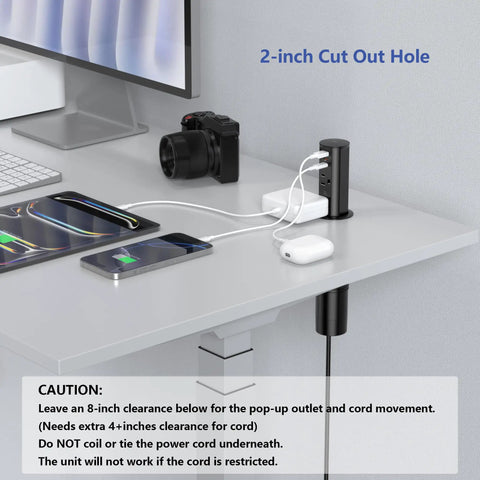 No Sweat Install 2 Inch Pop Up Receptacle For Countertops And Desks, shown in a desk with 2-inch cutout, charging devices with USB and AC ports.