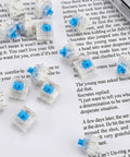 30Pcs Blue 3 Pin Mechanical Keyboard Switches With Clicky Tactile Feedback on paper background