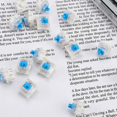 30Pcs Blue 3 Pin Mechanical Keyboard Switches With Clicky Tactile Feedback on paper background