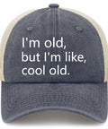 Old But Still Fly Funny Hat For Men And Women Golf Trucker Cap with breathable mesh, front view displaying humorous text.