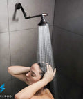Heavy Duty Solid Brass 11 Inch Shower Arm Extension with Oil Rubbed Bronze Finish in a modern shower setting.