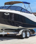Boat on trailer with 2 Pack 4.80-8 Trailer Tires With 8 Inch Rims 4 Lug On 4 Inch Bolt Pattern Center Bore 2.85 Inch