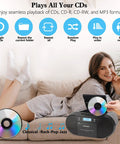 Retro Boombox CD Player And Cassette Player Combo with Bluetooth and CD shown in living room setting.