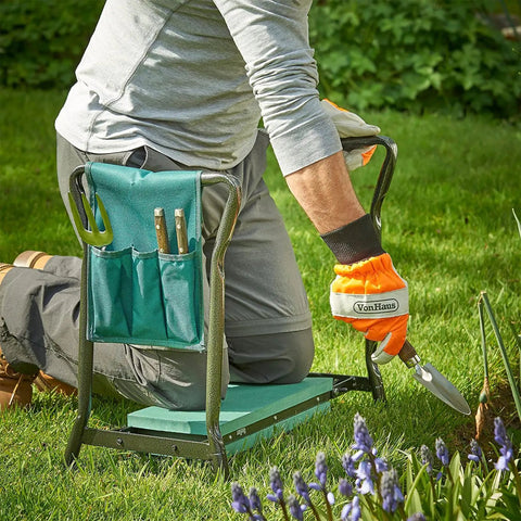 Person using 2 In 1 Portable Garden Kneeler Bench And Seat Stool With Tool Bag Accessory and folding steel frame in garden