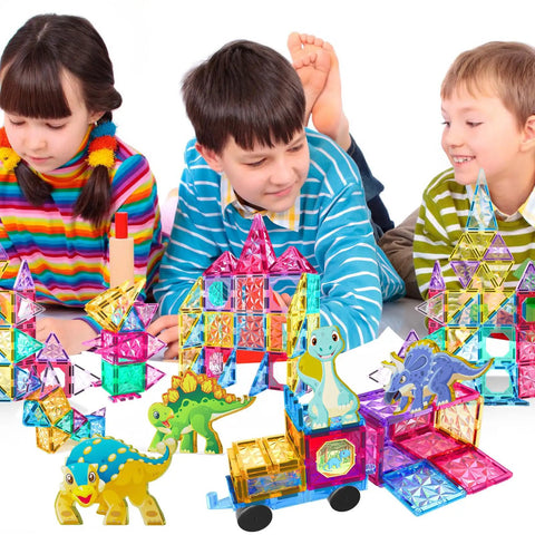 Children playing with Magnetic Tiles Building Blocks Set for Kids 110 Pieces STEM Construction Toy with Dinosaur Figures.