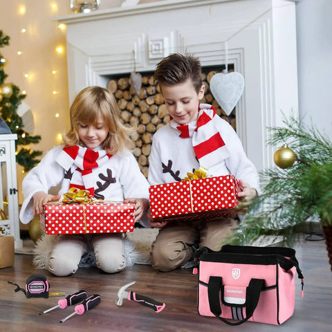 Children opening presents near 9 Piece Kids Real Hand Tool Set Pink Junior Tool Kit with pink storage bag and tools.