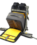Active 53 Camera Backpack With Front Rear And Top Access For Gear Built In USB Charger Port For Power Bank Removable Camera Box Insert Versatile For Photo Video Gear And Outdoor Travel In Khaki Green showing open front compartment and yellow interior.