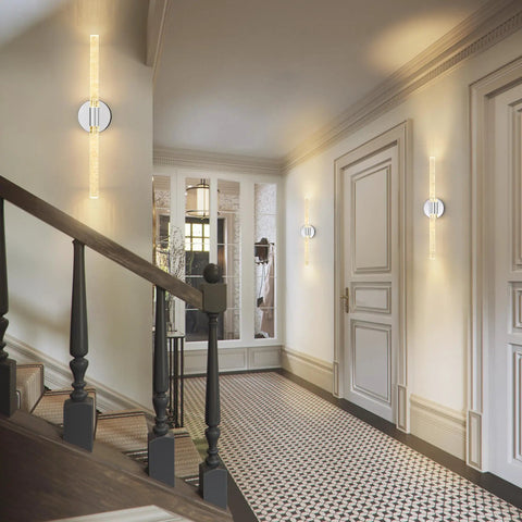 Gold Bubble Crystal Wall Sconce With LED Vanity Light in hallway, warm glow, mounted on a white wall near staircase