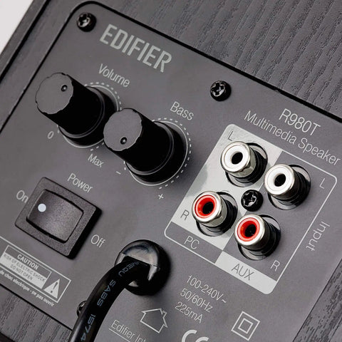 Back panel of 4 Inch Active Bookshelf Speakers With 24W RMS Front Ported Desktop Studio Monitor, showing RCA and AUX inputs.