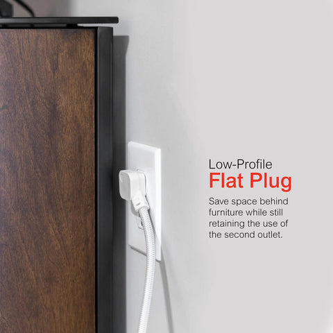 Three-Outlet Power Strip With Surge Protection, Pack Of 10, 8 Ft Braided Extension Cord, Grounded Flat Plug in use behind furniture