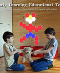 Children playing with toy in room with Hexagon LED Wall Light Kit 6 Pack With Modular Touch And Remote Control on wooden wall.