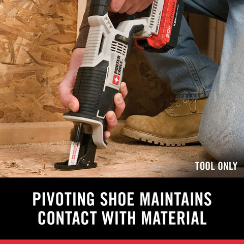 Close-up of Compact 20V Max Cordless Reciprocating Saw with variable speed, cutting wood with pivoting shoe.