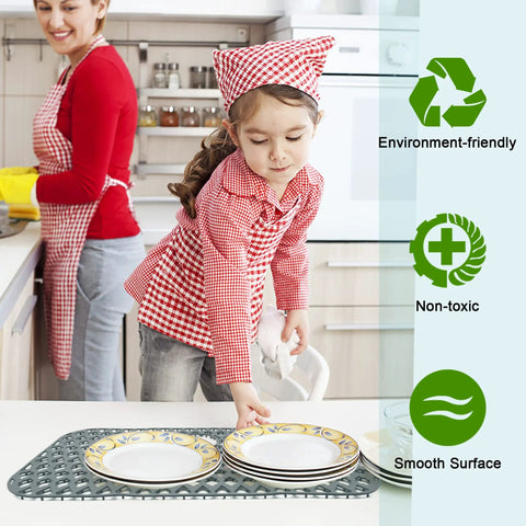 Big 30X16 Inch Silicone Sink Mat For Bottom Drain Flexible Non Slip Kitchen Sink Protector in use with child drying dishes