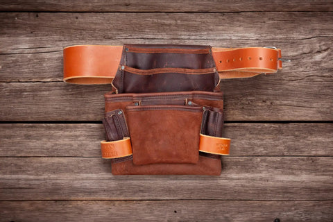 Top view of All Leather Heavy Duty Tool Pouch For Pros Reinforced Seams Pro Grade 4 Pocket Framing Pouch With Hammer Loop