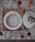 Top view of Korean Stone Pot For Bibimbap And Stews, All In One Heavy Duty Granite Clay Casserole with Wood Base and lid on side.
