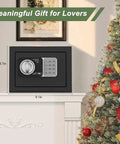 Compact Home Fireproof Safe Box With Digital Lock Mini Money Safe And Coin Safe With Code Wall Or Cabinet Safe For Personal Items Includes Fireproof Bag 0.236 Cu Ft Black Great For Home Office Desk Or Nightstand Storage Of Documents Cash Jewelry Passports displayed on a white shelf next to a decorated Christmas tree.