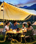 Family enjoying evening under tent with Camping String Lights 33Ft Long With 100 LEDs Rechargeable Outdoor Lights USB Powered