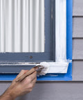 Applying stop peeling paint with triple thick high build binding primer that is low VOC and water based seals weathered surfaces on window trim.