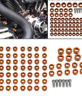 Orange Engine Bolt Cap Set for Harley Motorcycles 66Pcs with screws shown on table and installed on engine