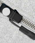 Close-up of Instant Zipper Repair Kit For Backpacks And Travel Gear, Zipper Slider Fix Pack on a zipper track, showing the removable tool.