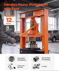 Rock Solid 12 Ton H Frame Shop Press Built Tough As Nails With Smooth Hydraulic Bottle Jack pulling heavy workpieces in a mechanic shop.