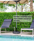 Heavy Duty Cast Iron Umbrella Base For Patio And Garden, 43lb Round Market Stand With Classic Bronze Finish by poolside