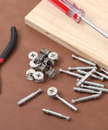 25 Sets Furniture Cam Lock Fasteners And Connecting Dowels 50 Pieces In Clear Storage Box shown with tools and wood surface