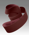Surface Conditioning Film Backed Belt 4 Inch By 132 Inch A MED Finishing Belt For Sanding And Deburring Durable Film Backing Delivers Smooth Consistent Finish On Metal And Wood Prep Projects. coiled red 3M 302D belt