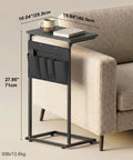 C Shaped End Table With Sliding Tray Under Sofa 28 Inch High Side Table With Storage Bag Black next to a couch with items on top