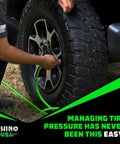 Person using Ultra Fast Four Tire Inflation And Deflation System With Four Way Hose Kit For Trucks Cars Trailers And Motorcycles Up To 155 Inch Wheelbase 2025 Improved With On Off Slide Valve For Precise Manual Airflow And Auto Pressure Equalizing on truck tire