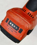 Professional Cordless Cut Off Tool Kit With Two 18V Batteries And Charger Includes Twenty Five Precision Cutting Discs Side Handle and Heavy Guards For Masonry Steel And Concrete Built Like A Tank For Rugged Crews Who Want Zero Hassle Punchy Staying, showing 18V Li-Ion battery pack.