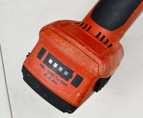 Professional Cordless Cut Off Tool Kit With Two 18V Batteries And Charger Includes Twenty Five Precision Cutting Discs Side Handle and Heavy Guards For Masonry Steel And Concrete Built Like A Tank For Rugged Crews Who Want Zero Hassle Punchy Staying, showing 18V Li-Ion battery pack.