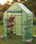 Outdoor Walk In Greenhouse 55 By 28 By 78 Inches with three tier shelves in garden, PE cover weather shield, tool free setup