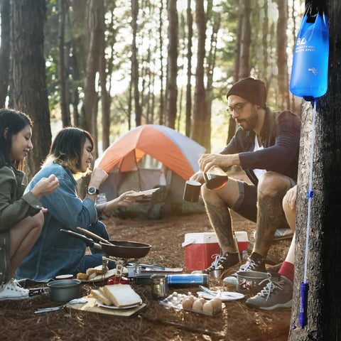Campers using 6L Gravity Water Filter System for camping and group trips NSF tested certified outdoor survival gear