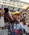 Heavy Duty Cut Resistant Arm Sleeves With Scratch Proof Armor For Gardening And Butchery Tasks Bite Resistant Guards worn by a worker.