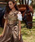 Badass Medieval Leather Belt For Renaissance Cosplay And Hella Cool Pirate Viking Props Featuring Embossed Buckle with elegant dress by horse.