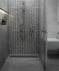 Bathroom with 36 Inch Matte Black Stainless Steel Rectangular Shower Drain With Grid Cover, Adjustable Feet, Hair Strainer