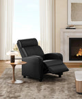 Comfy PU Leather Recliner Chair For Home Theater Seating With Lumbar Support in a living room, reclined near fireplace.