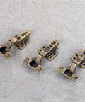 Soft Close Cabinet Hinges 2 Pack With Hydraulic Dampers, bronze finish hardware for cabinets on concrete background