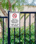 Straight Up Smoke Free Property Sign Featuring Bold No Smoking Symbol, 14 X 10 Inch Heavy Duty Rustproof Aluminum Metal Wall Yard Sign, Super Durable Indoor Outdoor Setup, Made Right In Usa on a fence.