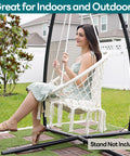 Woman sitting in Macrame Hammock Chair Hanging Swing For Indoor Outdoor Use 330 Lbs Capacity Handwoven Cotton Rope with Cushions