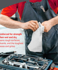 Mechanic using X80 Heavy Duty Cloths Brag Box White Industrial Shop Towels For Oil And Water Cleanup in workshop