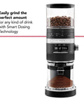Smart Dosing Burr Coffee Grinder KCG8433 Black Matte with grind settings and dosing technology, front view with coffee beans visible.